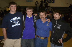 Photo by Brent Baker — The Tonasket Apple Pie Invitational could easily have gone by the moniker "Mitchell Invitational" as for the second straight year Tiger coach Dave Mitchell's sons brought their teams to the tourney. Patrick (left) is the head coac