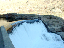 The spillway at Enloe Dam as viewed from the west side of the river. The dam, originally built in the 1920s, has not produced electric power since the late 1950's. The Dam was constructed on top of a natural 18-foot falls. Photo by Gary DeVon