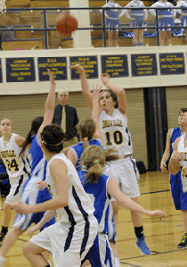 2333a Oroville's Becky Arrigoni shoots for two points against the Manson Trojans at the Hornet's home game in Coulton Auditorium last Thursday.
