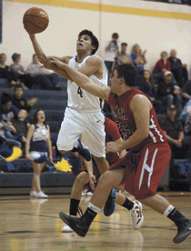 2349a Photo by Brent Baker — Michael Orozco scored eight key fourth quarter points in the Tigers' victory over Omak, but his defense on the Pioneers' Country Pakootas was a big reason for Tonasket's victory.