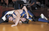 2350a Photo by Brent Baker — The Hornets' Alex Kelly battled through a painful back injury to clinch a spot at next week's eastern regional tournament before settling for a sixth-place finish on Saturday.