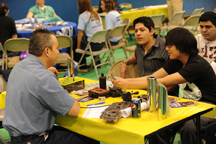 Luis Perez owner of Oroville Community Auto talks with students about his business at the Career Fair held in February at Oroville High School.  Photo by Gary DeVon