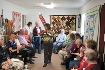 2538a Linda Black, volunteer coordinator for the Tonasket Visitors and Business Resource Center (TVBRC) gives a season-opening pep talk to her team of nearly 30 volunteers on Wednesday, April 25. Black also arranged for presentations by three area business owne