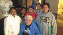 Members of Tonasket Elementary fourth grade teacher Scott Olson's class, including (l-r) Ruby Capote, Kevin Garcia, Enrique Long-Sandoval, Kyndall Rollins and Christina Torres, visited 105-year-old Lula Gardener to learn about what school was like 100 yea