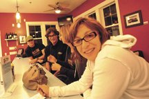 Seattle filmmakers Geoff  Klein (left) and Mo Fine (right) and friends relax at the Globe at Veranda Beach Resort following the first night of the Tumbleweed Film Festival in Oroville earlier this month. The two bring their festival to Osoyoos this weeken