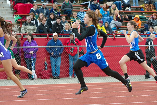 Tonasket's Emily Mills set a PR in the 400 to clinch a spot on the medal stand. She'll race in the finals on Saturday.