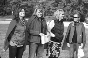 Linda Black honored her  team of "Wonder Women" with capes during Friday's groundbreaking, including (l-r) Elise Peacemaker, Jara Donner, Cathy Olson and Stacey Kester.