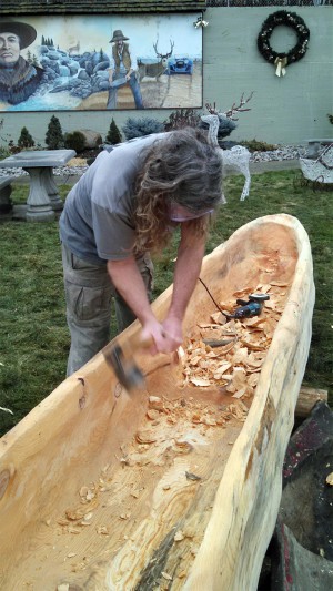 Churchill Clark says that about 95 percent of his carving is done using an adze, with a little bit of help as needed from more modern tools. 