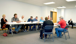 North Pine Creek resident Jack Dennison testifies before Okanogan County Planning Commission members April 11, 2016.