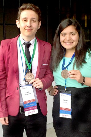 Yigit Karemis and Nichole Juarez show off their medals for placing at the Washington State Future Business Leaders of America Conference in Spokane. The two will be heading to Atlanta, Georgia to compete at Nationals in June. Submitted photo