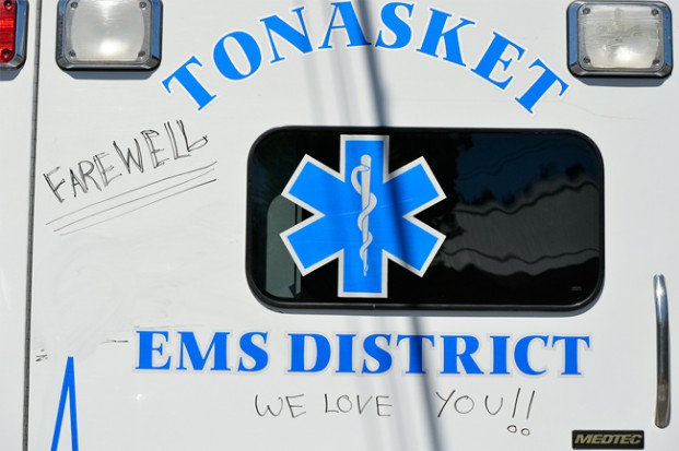 This Tonasket EMS ambulance, driven by EMT Lelani Kilpatrick in the Tonasket Founders Day Grand Parade Saturday, June 4, caused a stir and concern among community members reading the words ‘Farewell’ and ‘We love you’ written across the back. Katie Teachout/staff photo