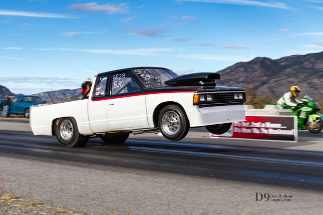 Possible Cutline: Peachland's Phil Walter lofts the front end of his '86 Nissan truck off the start line at Richter Pass Motorplex in Osoyoos, BC. Walter and his opponent, Warren Brown ('02 Kawasaki are a well-matched set as two of the fastest vehicles on Osoyoos' tarmac.