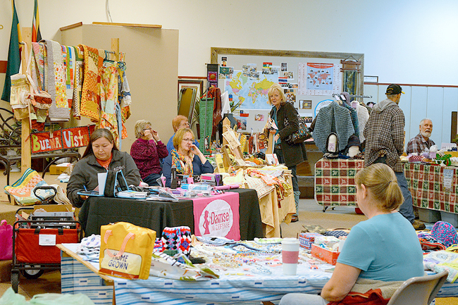 Katie Teachout/staff photo Tonasket’s annual WinterFest features bazaars, book sales, bonfires, fire truck rides, visits with Santa, caroling and much, much more.