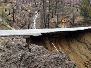 WSDOT photo A section of Hwy. 20 four miles west of Loup Loup was undercut by flood waters. The WSDOT says it will be weeks, not days before it is repaired.