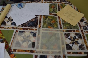 Photos by Katie Teachout Intricate patterns are  hand-drawn by Curt Ericson, then used to stitch together quilts created by his wife, Judy.