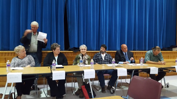 Katie Teachout/staff photo North Valley Hospital Board of Commissioner Candidates listen to incumbent Clarice Nelson answer a question posed by emcee Ernie Bartelson at a forum held at Tonasket High School Wednesday, Oct. 11. Pictured (l-r) are: Helen Casey, Jean Pfeifer, Nelson, Jerry Bradley, Matt Tibbs and Matt Alexander. 