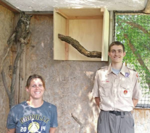  Nathan Rise with Lisa Lindsey with the Okanogan Wildlife League (OWL). Rise built shelter boxes for raptors housed at the animal rescue. 
