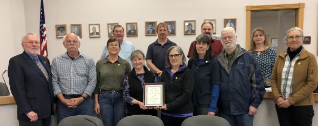 Submitted photo Members of the Okanogan County Watch were honored with the Key Award by the Washington Council of Open Government. Some of the team are pictured here with Mike Fancher, WCOG board member and Okanogan County Commissioners Jim Detro, Andy Hoover and Chris Branch, as well as Clerk Lanena Johns. The existing team includes note takers George Thornton (Oroville), Gina McCoy, Emily Sisson (Winthrop), Katie Haven (webmaster, Methow) with support staff Rick Gillespie (retiring, Chesaw) and Jan Young (Pine Forest).