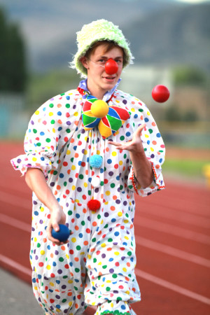 Laura Knowlton/staff photo A closn from the Wenatchee Youth Circus juggles at Tonasket High School.