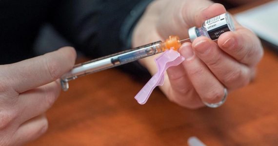 A vial of the Pfizer-BioNTech COVID-19 vaccine is displayed in Truro, N.S. on Wednesday, Feb. 24, 2021. THE CANADIAN PRESS/Andrew Vaughan