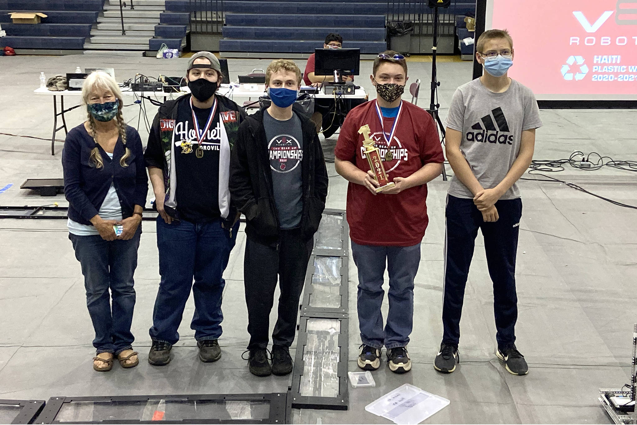 Submitted photo
Oroville Robotic’s Team Coach Laara Peters-Kessler, winner of the Team Mentor Genius Award and Outstanding Roboteer winner Odin Finsen with teammates and fellow champions Michael Oaks, Tyler Charnholm and Trevor Miller.