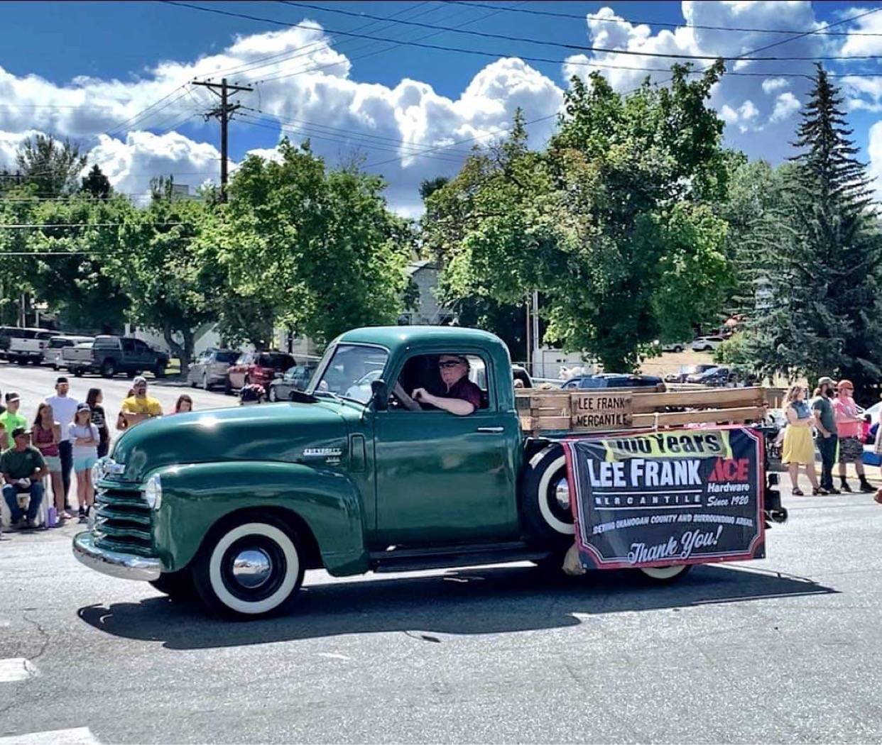 Stacey Kester/submitted photo
Dave Kester, owner of Lee Frank Mercantile, drove Old Joe, a 1950 Chevy pickup truck, with with banners on the side, to celebrate the 100th year anniversary of the store, during Tonasket’s Founders Day Weekend.