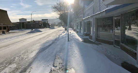 Gary DeVon/staff photo
Drifted snow piled up on the sidewalks on the east side of downtown in Oroville last Sunday. Despite the sun shining, the temperatures were in single digits during the day, dropping to much lower at night. With the added wind chill factor the temps felt well below freezing. The National Weather Service is warning of "dangerously cold temperatures" in Eastern Washington and Northern Idaho this week.