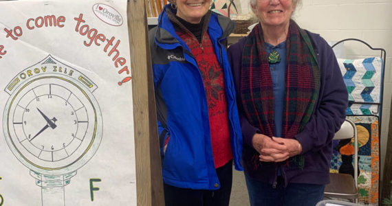 Submitted photo
Lynn Chapman and Hilary Blackler collecting donations for the town clock at the Brewstitched Holiday Market in November.
