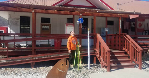 Angela Larson/staff photos
Patrick Miller with the U.S. Geological Survey next to the flagpole at the Oroville Depot Museum. Miller said the flood of 1894 reached a level of 927 feet of elevation, or 18 feet above the regular water level of 909 feet today.