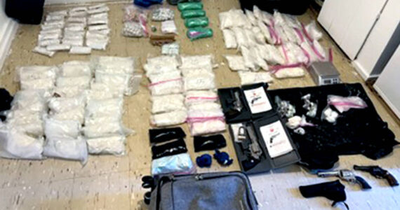 DEA photos Some of the more than 100 pounds of illegal drugs and weapons seized by federal, state, local and tribal law enforcement last Monday near Oroville, Washington.