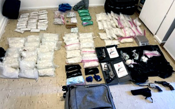 DEA photos Some of the more than 100 pounds of illegal drugs and weapons seized by federal, state, local and tribal law enforcement last Monday near Oroville, Washington.