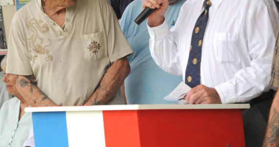 Louie Wilson with the Oroville American Legion Post #84 speaks with Mike Stewart, a Vietnam-era veteran. Wilson was one of the people credited with helping to get Highway 20 renamed as the Vietnam Veterans Memorial Highway.