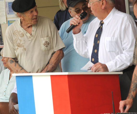 Louie Wilson with the Oroville American Legion Post #84 speaks with Mike Stewart, a Vietnam-era veteran. Wilson was one of the people credited with helping to get Highway 20 renamed as the Vietnam Veterans Memorial Highway.