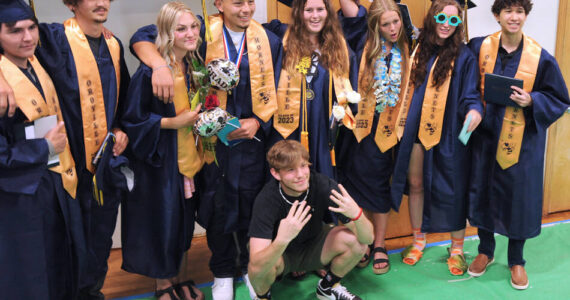 A few of the Oroville High School graduates pose as a group for family and friends after their commencement ceremony on Saturday, June 3. Gary DeVon/staff photos