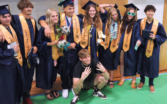 A few of the Oroville High School graduates pose as a group for family and friends after their commencement ceremony on Saturday, June 3. Gary DeVon/staff photos
