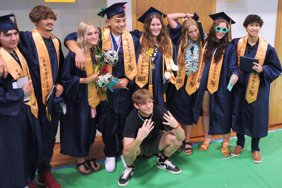 A few of the Oroville High School graduates pose as a group for family and friends after their commencement ceremony on Saturday, June 3. Gary DeVon/staff photos