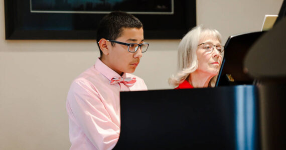 Daniel Poncé with his music teacher Roz Nau of Tonasket. He has taken lessons from Nau, with the Okanogan County Music Teachers Association, for the last year. Laura Knowlton/staff photo