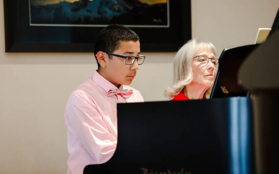 Daniel Poncé with his music teacher Roz Nau of Tonasket. He has taken lessons from Nau, with the Okanogan County Music Teachers Association, for the last year. Laura Knowlton/staff photo