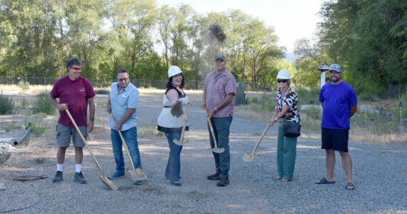 Okanogan County Commissioner Jon Neal, Oroville Mayor Ed Naillon, OHA Executive Director Ashley Range and OHA Commissioners Gary DeVon, Susan Speiker and Ben Peterson, turn the first shovels of dirt at the future site of the Oroville Orchard Apartments. <em>Submitte photo</em>