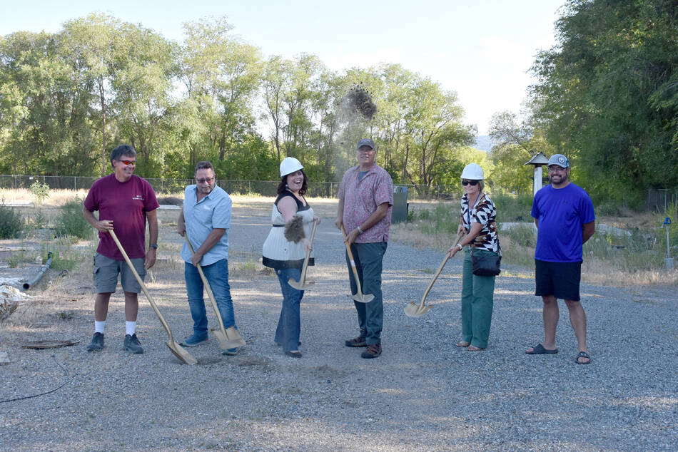 Okanogan County Commissioner Jon Neal, Oroville Mayor Ed Naillon, OHA Executive Director Ashley Range and OHA Commissioners Gary DeVon, Susan Speiker and Ben Peterson turn the first shovels of dirt at the future site of the Oroville Orchard Apartments. <em>Submitte photo</em>