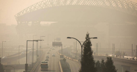 Lumen Field is hidden by smoke as seen from the Dr. Jose Rizal Bridge on Thursday, Oct. 20, 2022. (Amanda Snyder/Crosscut)