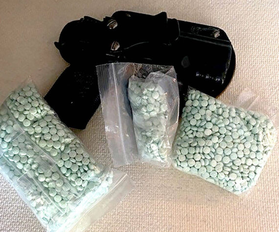 Guns and drugs were seized from a Bridgeport residence by law enforcement and a man and a woman were booked into Okanogan County Jail for kidnapping, assualt and drug possession.. The male suspect was also booked on weopons charges. OSCO photo