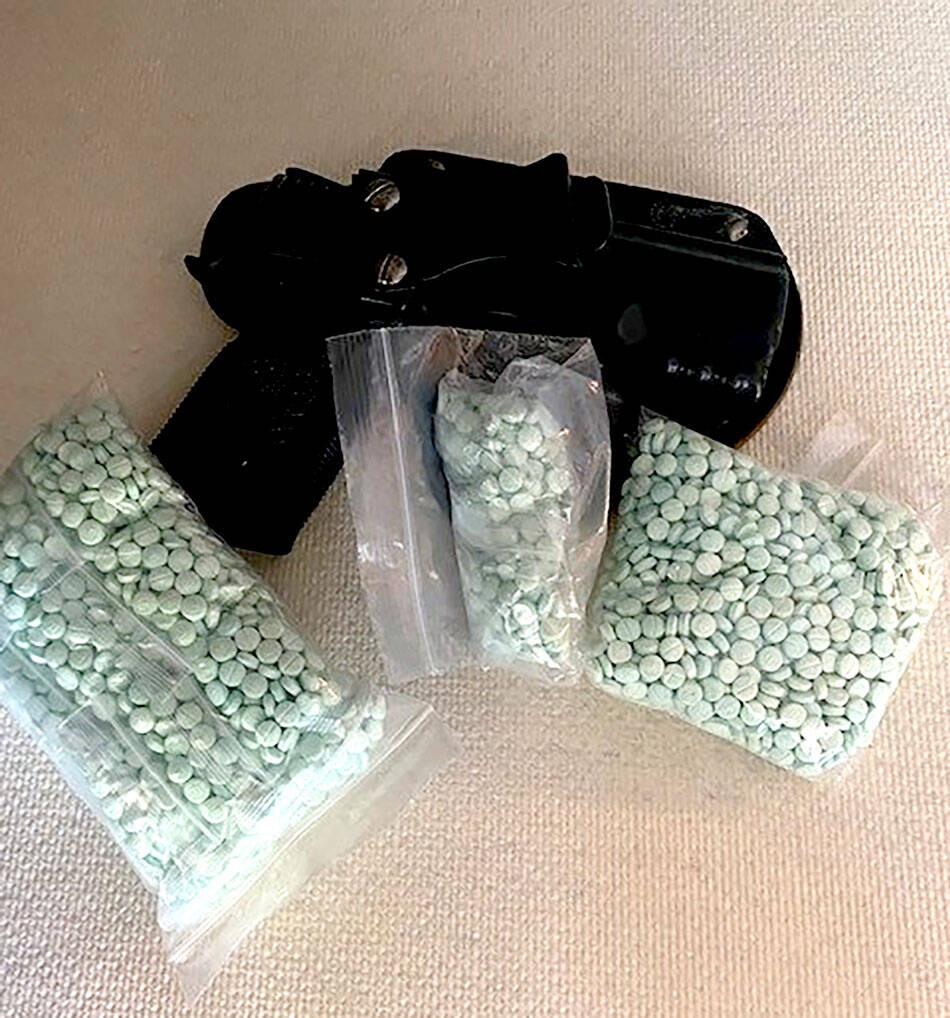 Guns and drugs were seized from a Bridgeport residence by law enforcement and a man and a woman were booked into Okanogan County Jail for kidnapping, assualt and drug possession.. The male suspect was also booked on weopons charges. OSCO photo