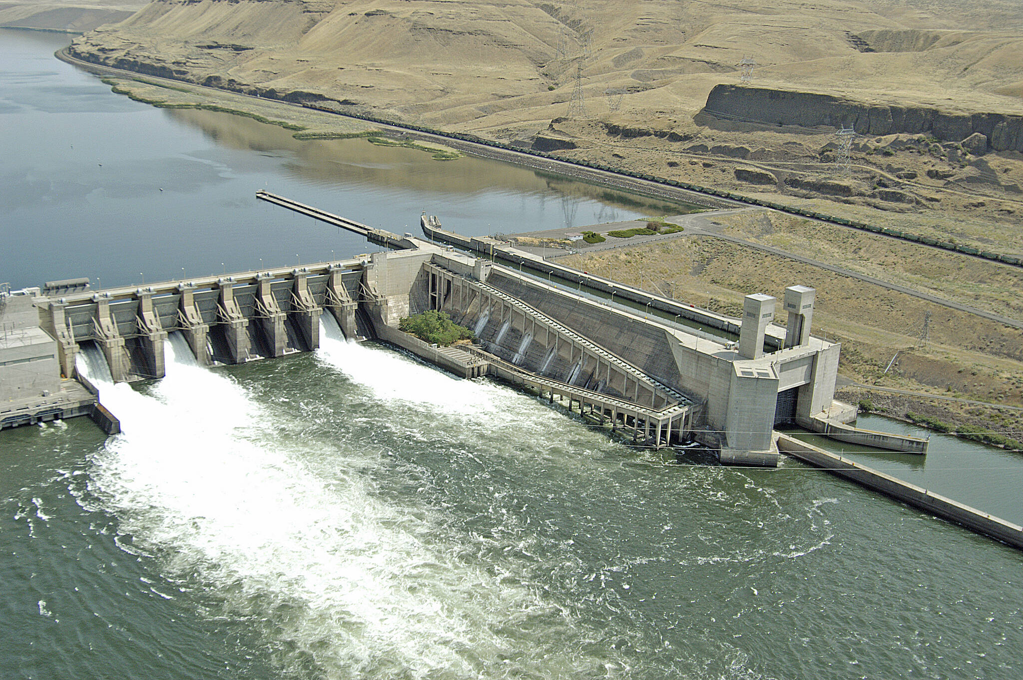 KEVIN WINGERT | BONNEVILLE POWER ADMINISTRATION The Lower Monumental Dam on the lower Snake River near Kahlotus is one of four lower Snake hydroelectric dams in the Federal Columbia River Power System.
The Lower Monumental Dam on the lower Snake River near Kahlotus is one of four lower Snake hydroelectric dams in the Federal Columbia River Power System. Kevin Wingert/BPA photo