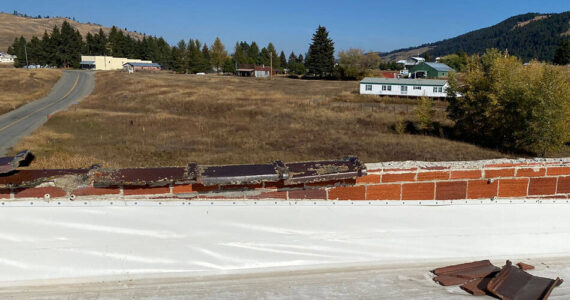 The roof on the Molson Grange Hall and the crumbling parapet. Submitted photos