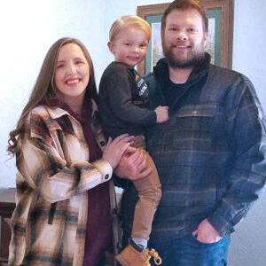 Brandon Heilman and family at the Oroville office of Farmer’s Insurance. The familiar local agent has taken over ownership of the business. Angela Larson/staff photo