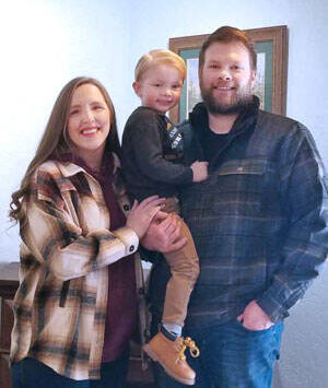 Brandon Heilman and family at the Oroville office of Farmer’s Insurance. The familiar local agent has taken over ownership of the business. Angela Larson/staff photo