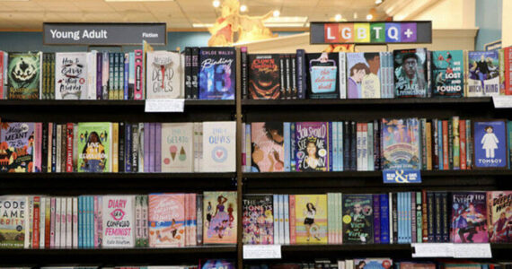 LGBTQ+ section next to the “young adult,” section at Barnes & Noble in Olympia. <em>Washington State Journal photo</em>