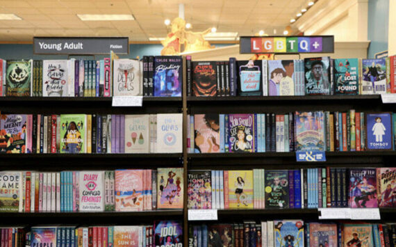 LGBTQ+ section next to the “young adult,” section at Barnes & Noble in Olympia. <em>Washington State Journal photo</em>