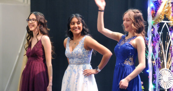 An exhuberent Sierra Buckmiller waves to the audiance after being introduced at Selection Night.